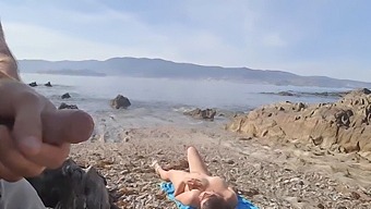 A European Nudist Milf Gives A Blowjob To An Exhibitionist On The Beach